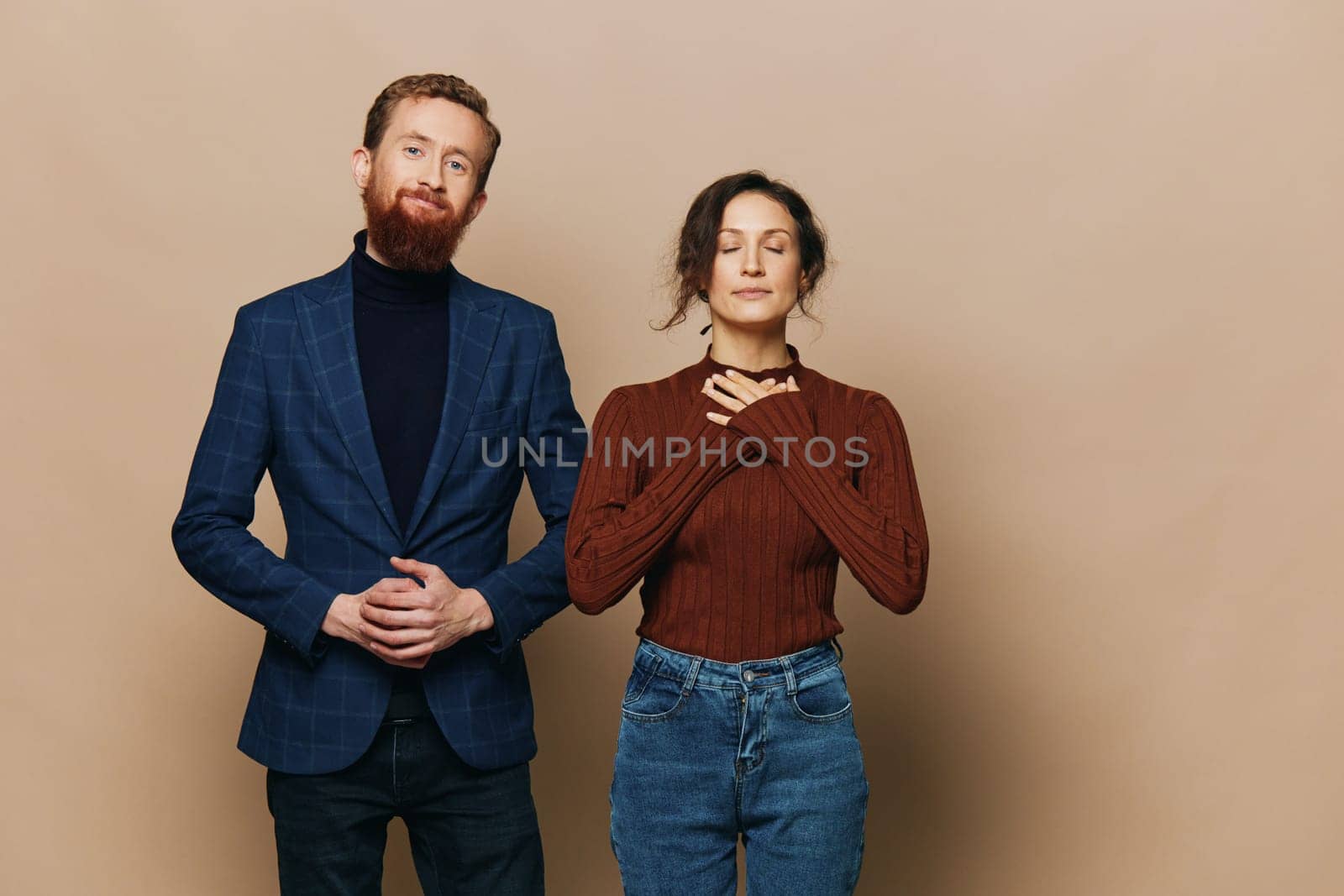 Man and woman couple in a relationship smile and interaction on a beige background in a real relationship between people by SHOTPRIME