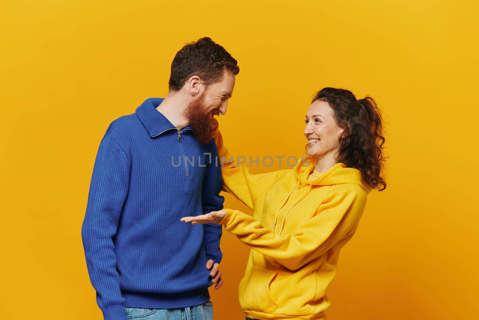 Man and woman couple smile and happiness, yellow background, family by SHOTPRIME