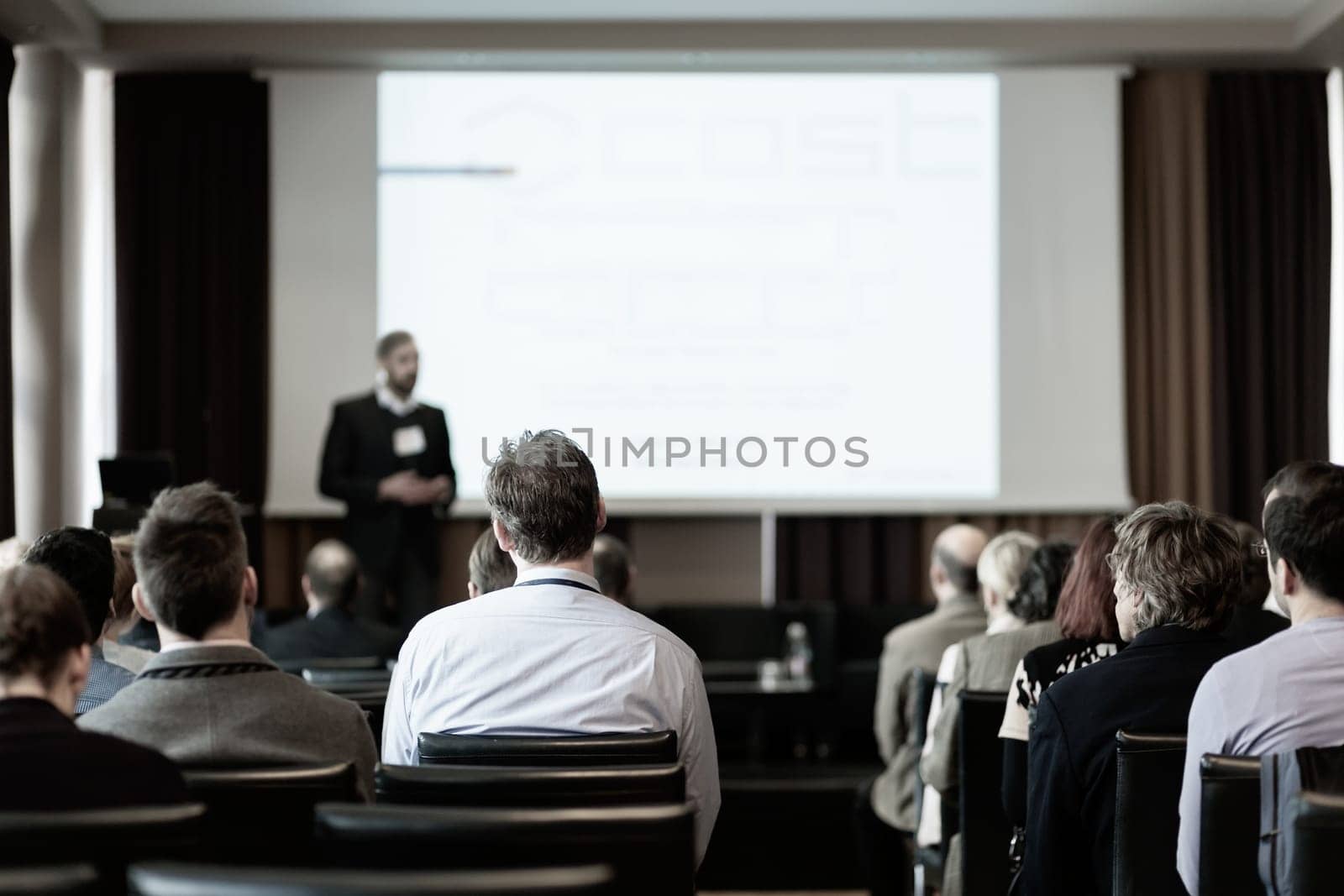 Speaker at Business Conference and Presentation. Audience in the conference hall. Business and Entrepreneurship.