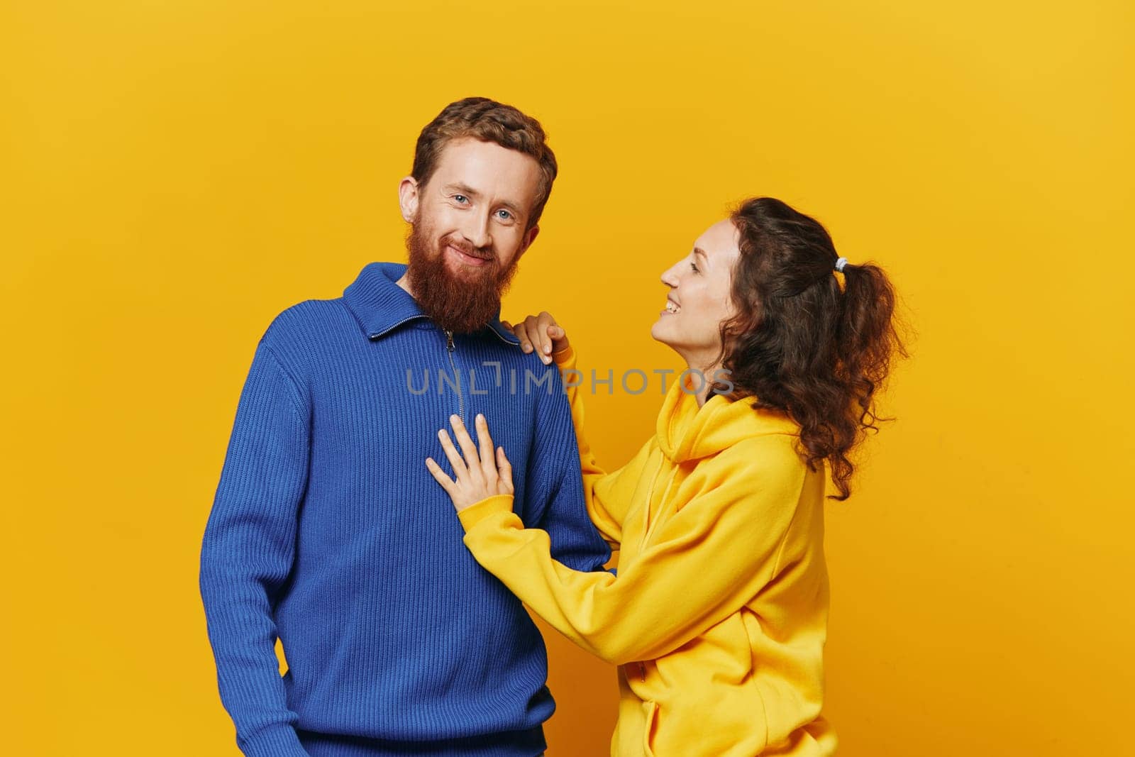 Man and woman couple smile and happiness, yellow background, family by SHOTPRIME