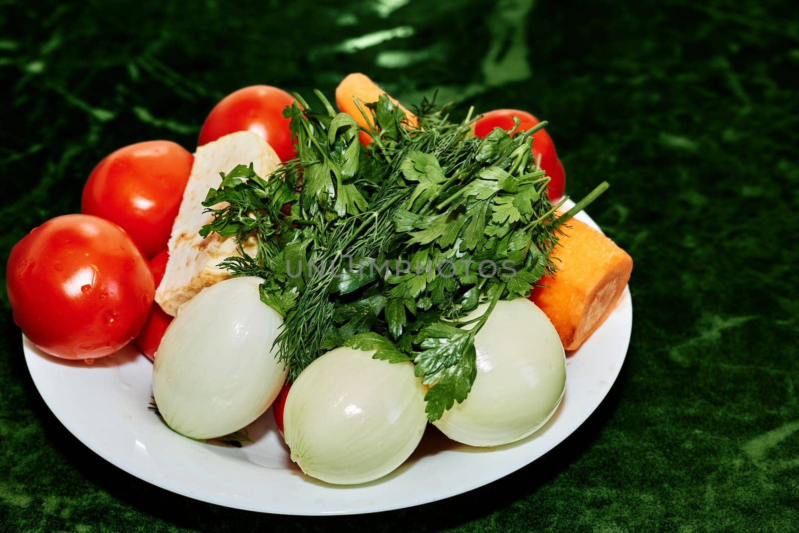 a plant or part of a plant used as food, typically as accompaniment to meat or fish, such as a cabbage, potato, carrot, or bean