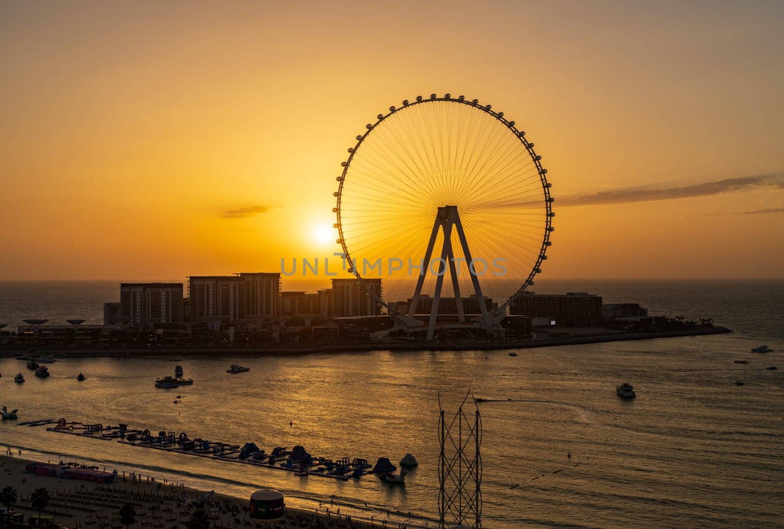 Sunset behind Ain Dubai observation wheel on Bluewaters Island by steheap