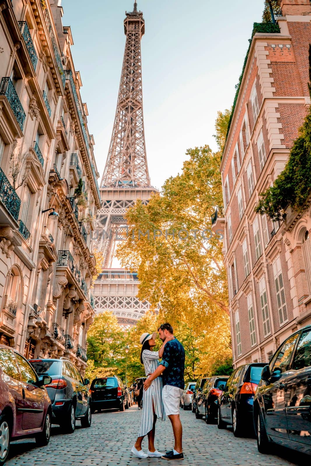 couple men and woman honeymoon Paris Eiffel tower France, couple men and woman city trip in Paris during summer