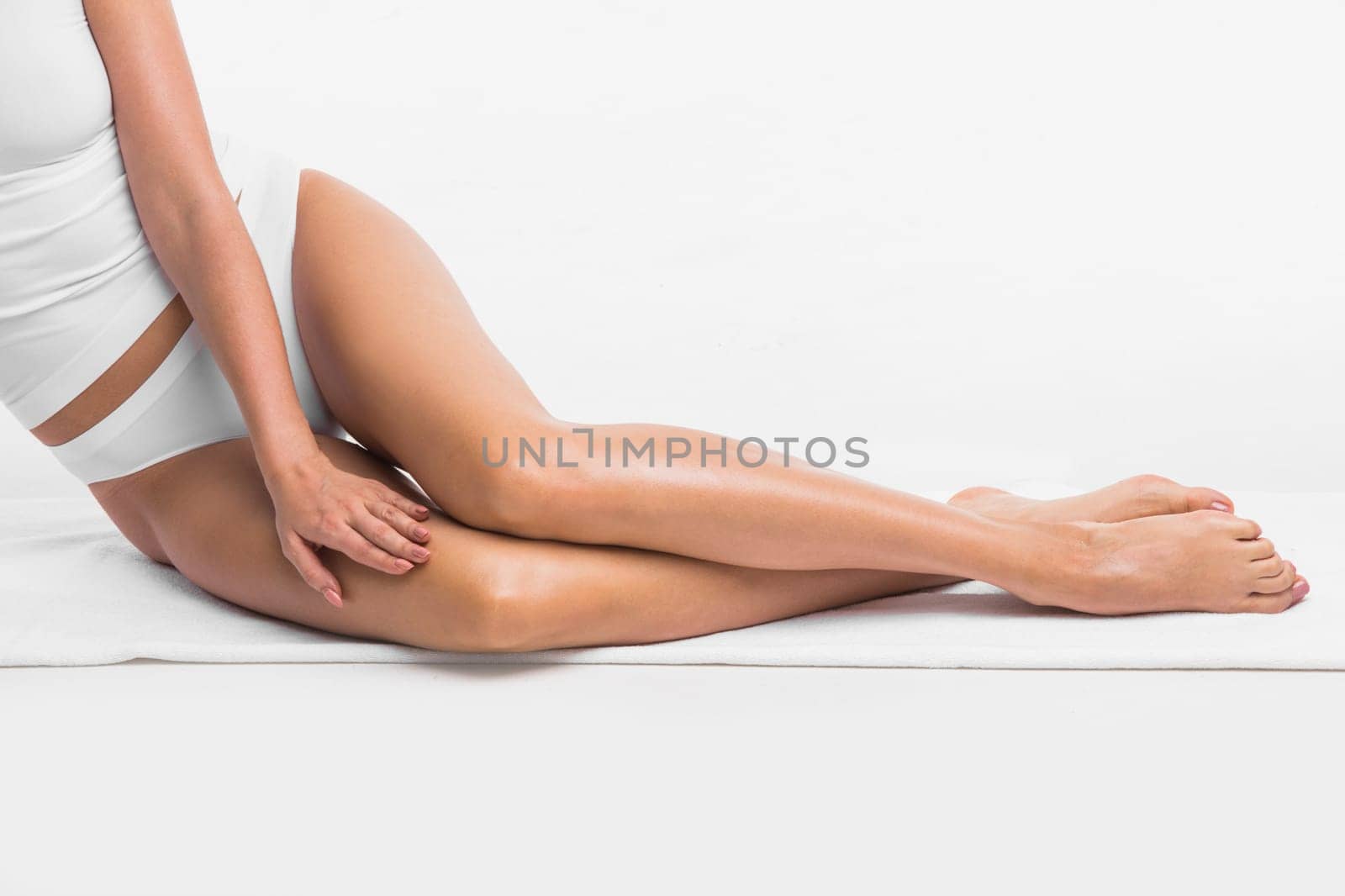 Female legs studio shot by Yellowj