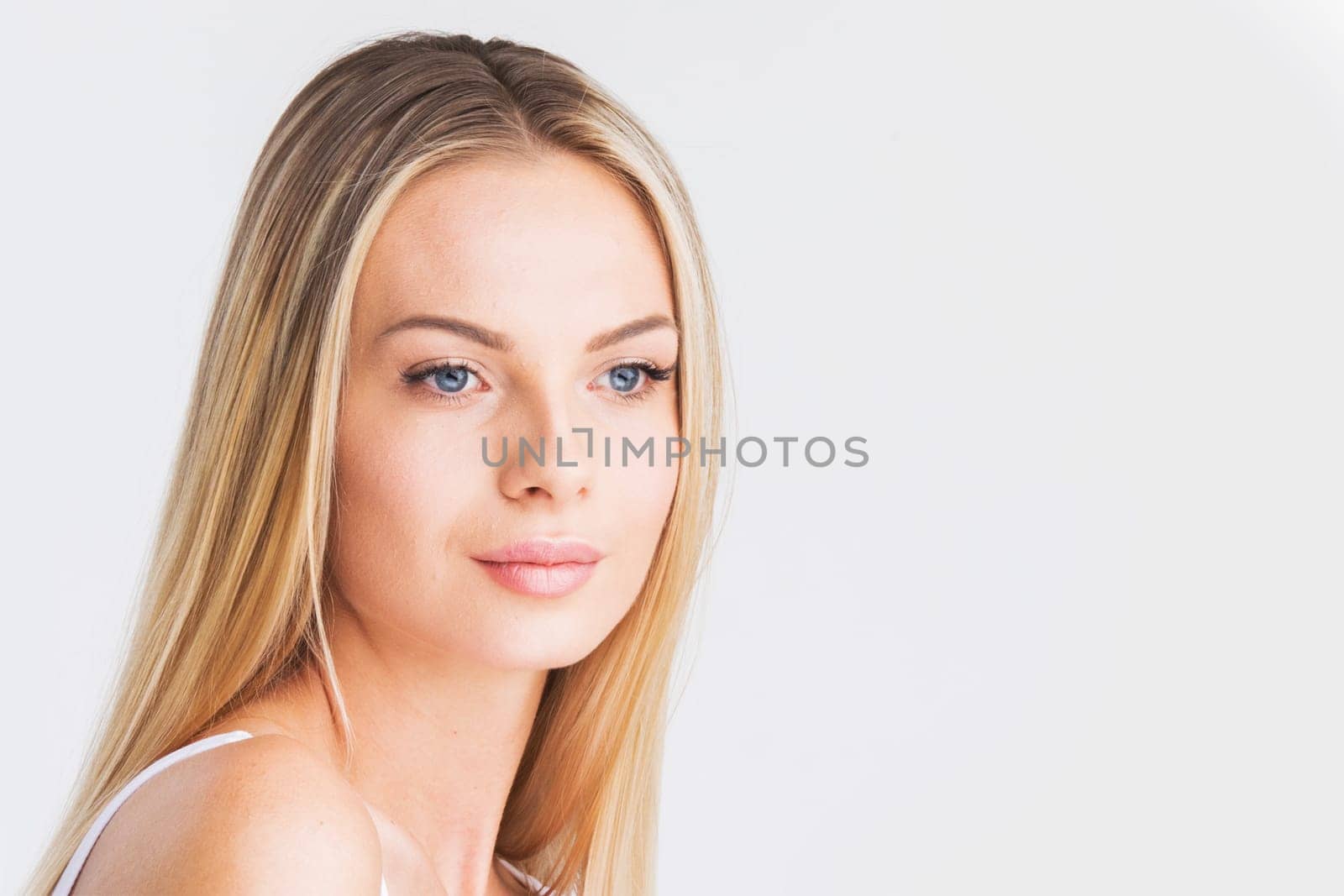 Blonde woman natural beauty closeup portrait