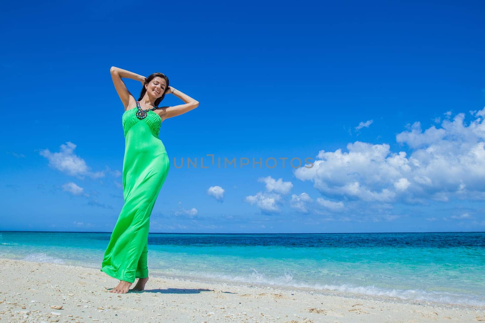 Woman at sea beach by Yellowj