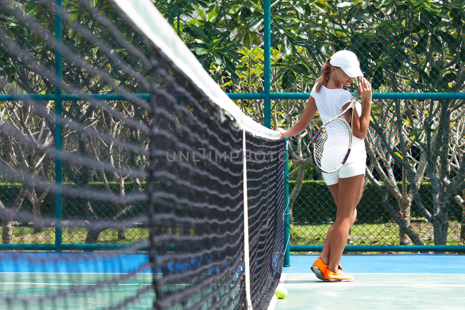 Female tennis player on court