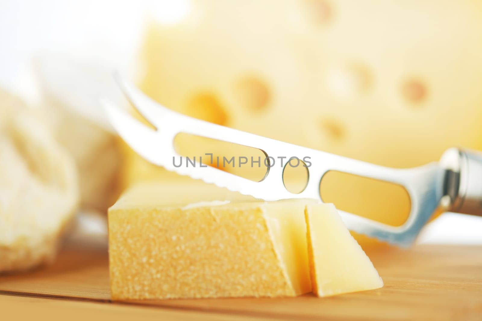 cheese with a cheese knife