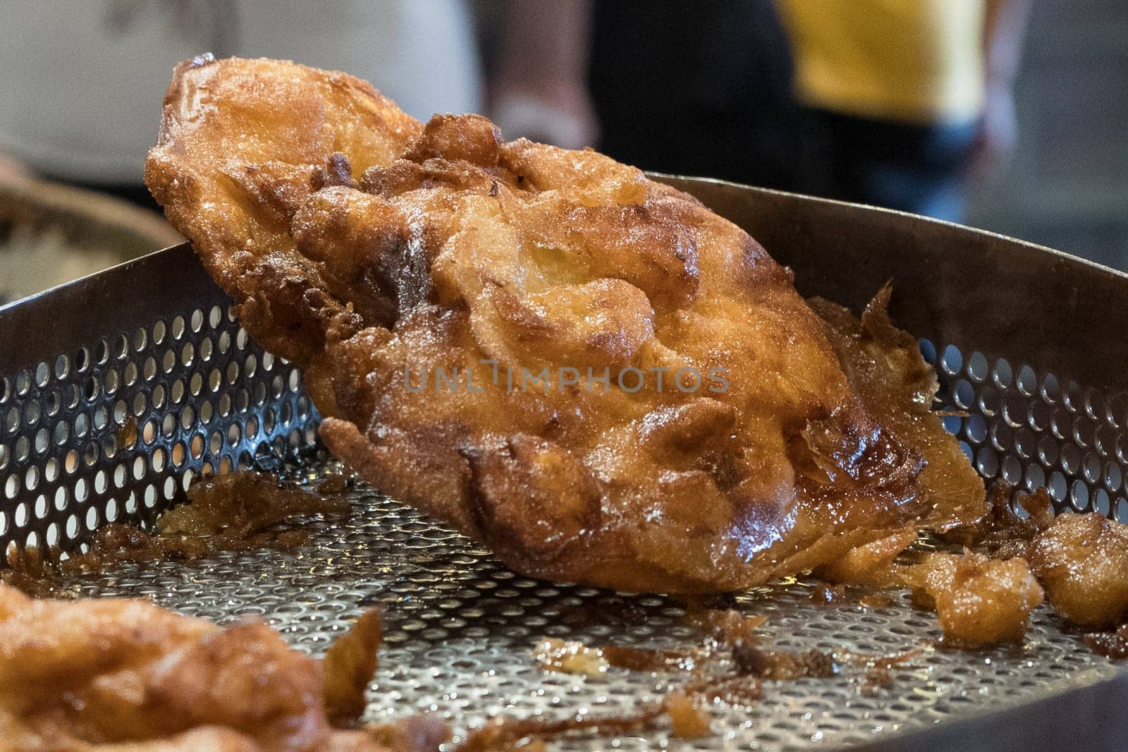 The fried cempedak which is the fruit similar with jackfruit but with strong smell and softer. Covered with flour. Food photography.