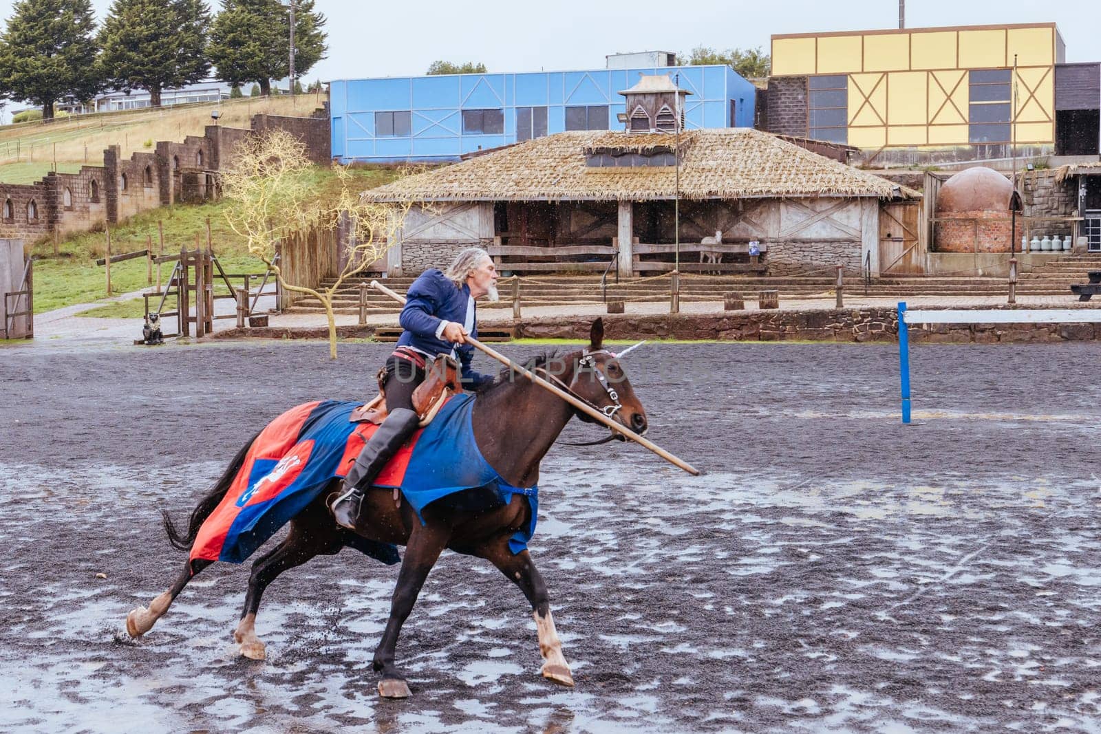 BALLARAT, AUSTRALIA - April 7 2023: Medieval horse show at the popular tourism destination of Kryal Castle which is a medieval village near the country Victorian town of Ballarat on a stormy autumn morning