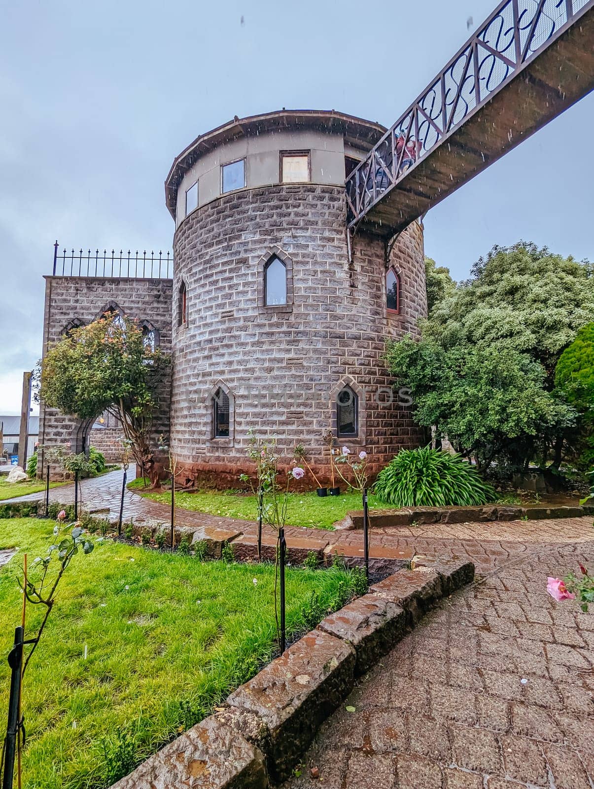 BALLARAT, AUSTRALIA - April 7 2023: The popular tourism destination of Kryal Castle which is a medieval village near the country Victorian town of Ballarat on a stormy autumn morning