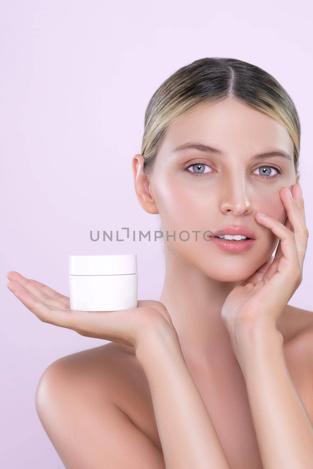 Alluring beautiful perfect cosmetic skin woman portrait hold mockup jar cream or moisturizer for skincare treatment, anti-aging product in isolated background. Natural healthy skin model concept.