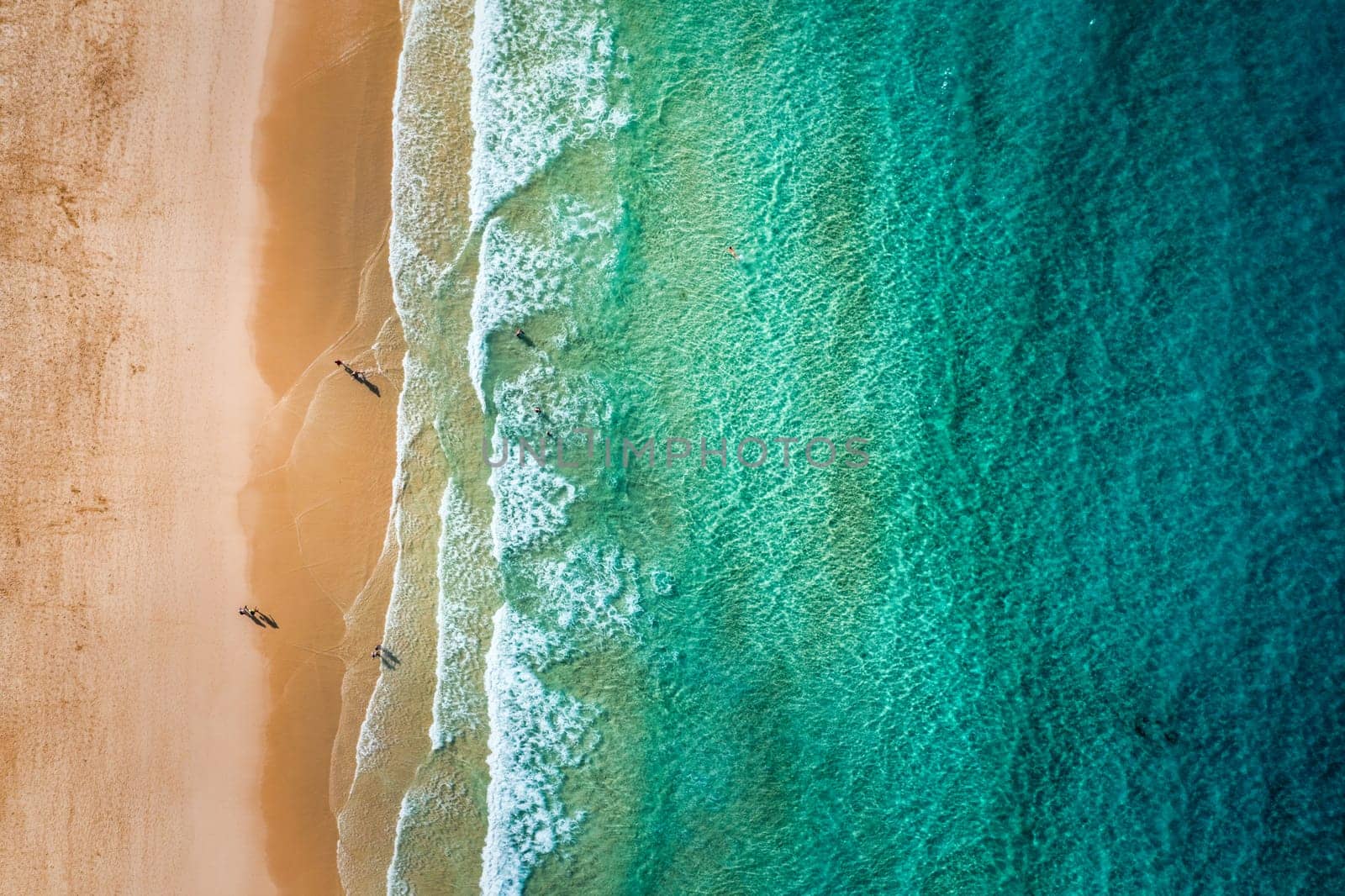 Aerial view of beach in Corralejo Park, Fuerteventura, Canary Islands. Corralejo Beach (Grandes Playas de Corralejo) on Fuerteventura, Canary Islands, Spain. Beautiful turquoise water and white sand.