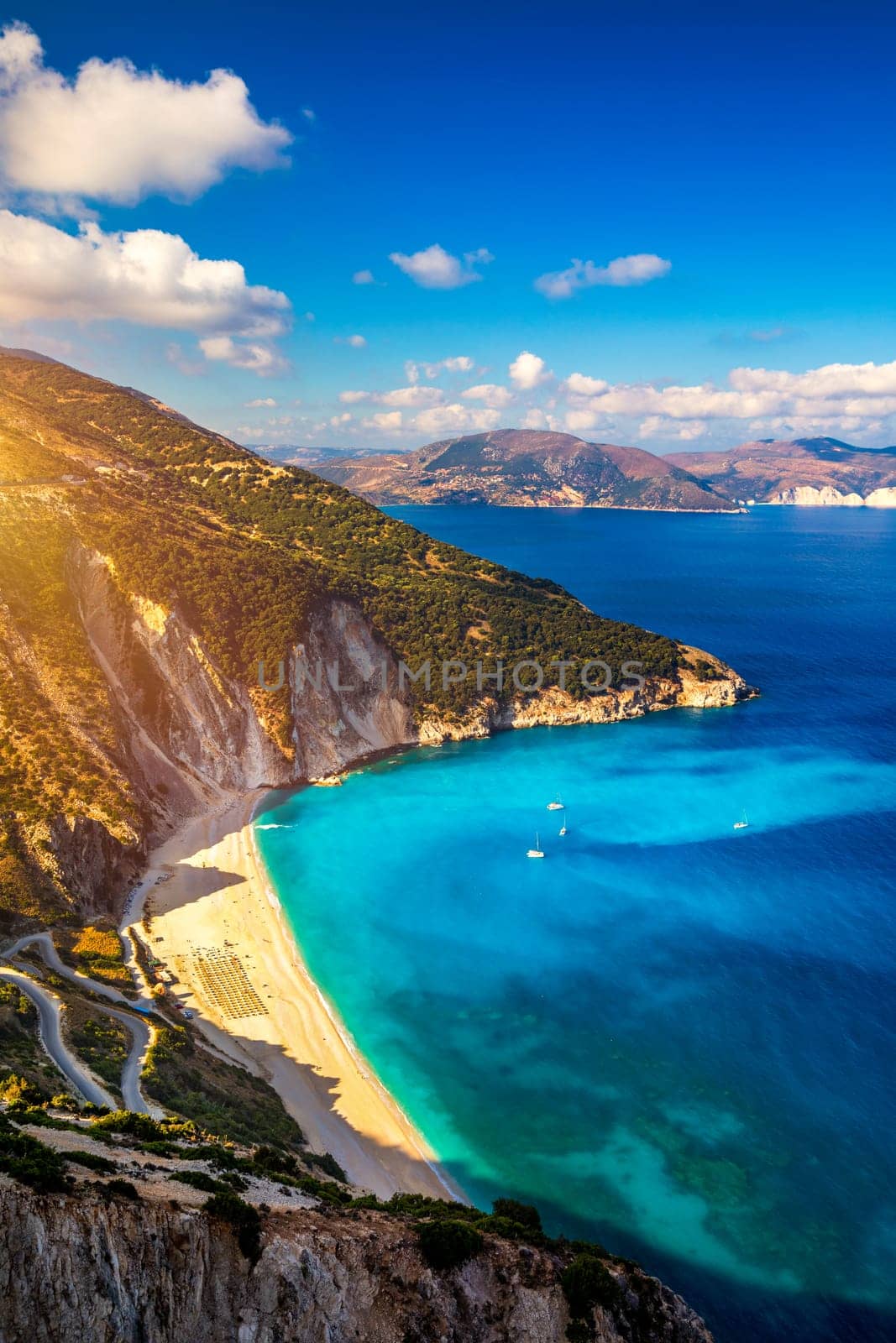 Aerial drone view of iconic turquoise and sapphire bay and beach of Myrtos, Kefalonia (Cephalonia) island, Ionian, Greece. Myrtos beach, Kefalonia island, Greece. Beautiful view of Myrtos beach.