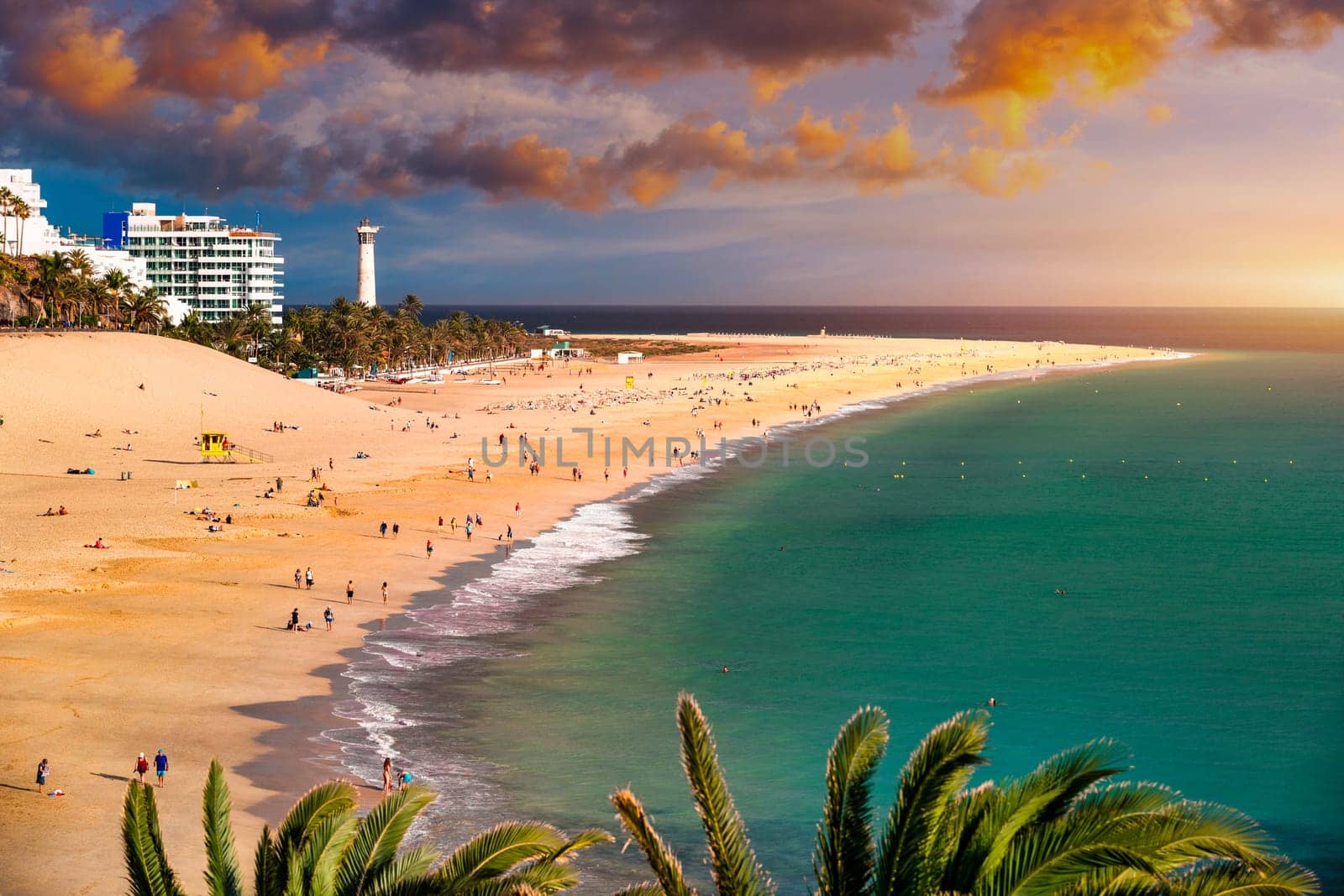 Morro Jable, Fuerteventura, Spain. Breathtaking beach Playa del Matorral in the rays of the sunset. Morro Jable and Playa del Matorral, Fuerteventura, Canary Islands, Spain, Atlantic, Europe