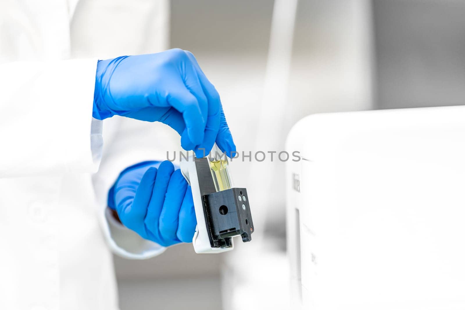 research in a biochemical laboratory using modern technologies. use a computer for scientific research by Edophoto