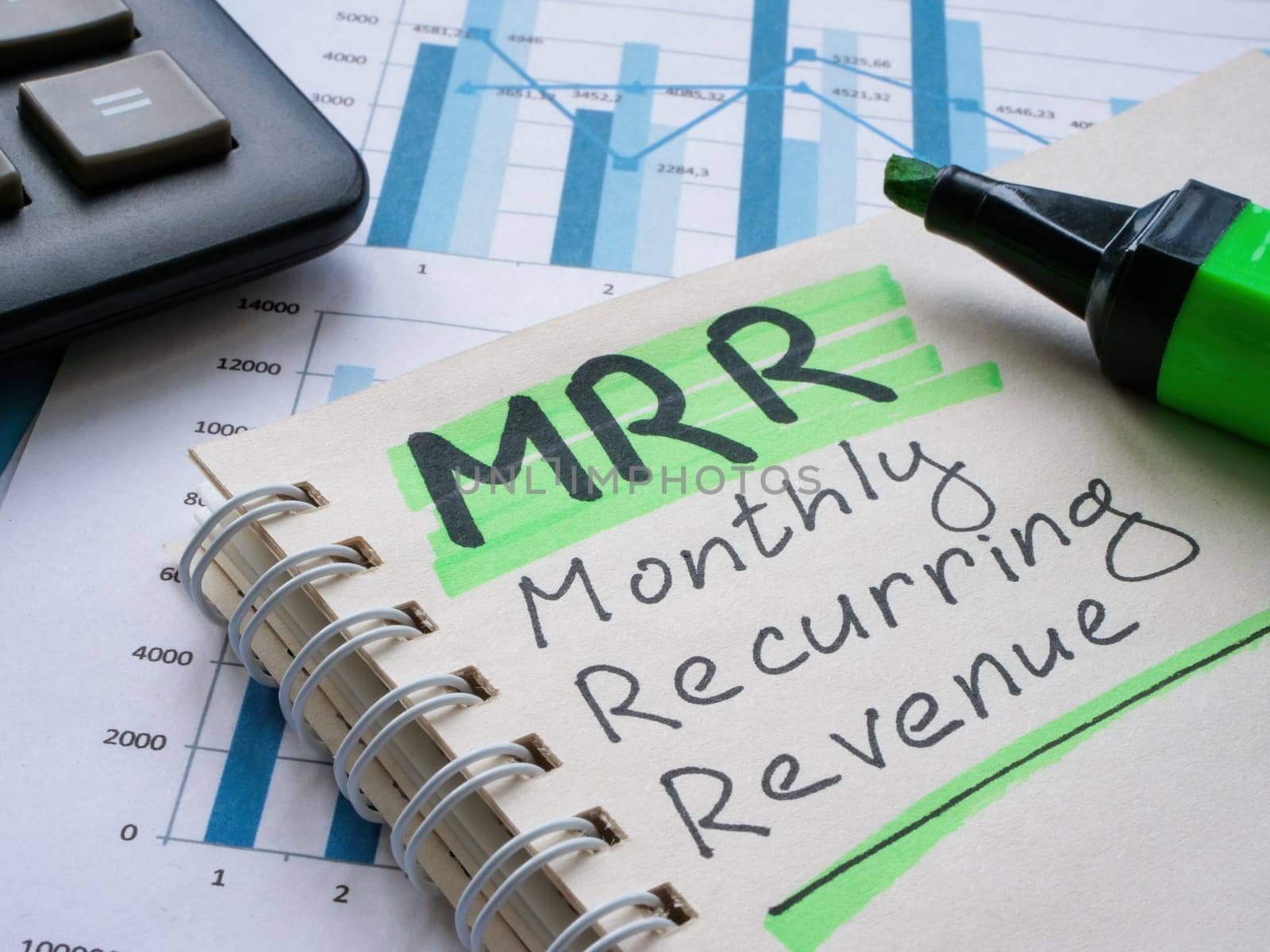 Page with marks about MRR Monthly Recurring Revenue. by designer491