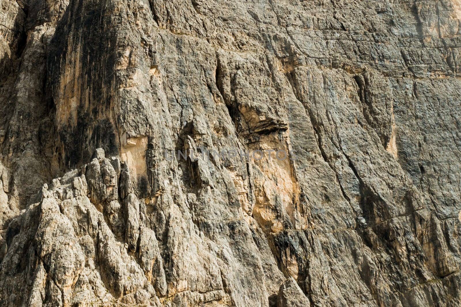 High mountain rocky cliffs in Alpine mountains.