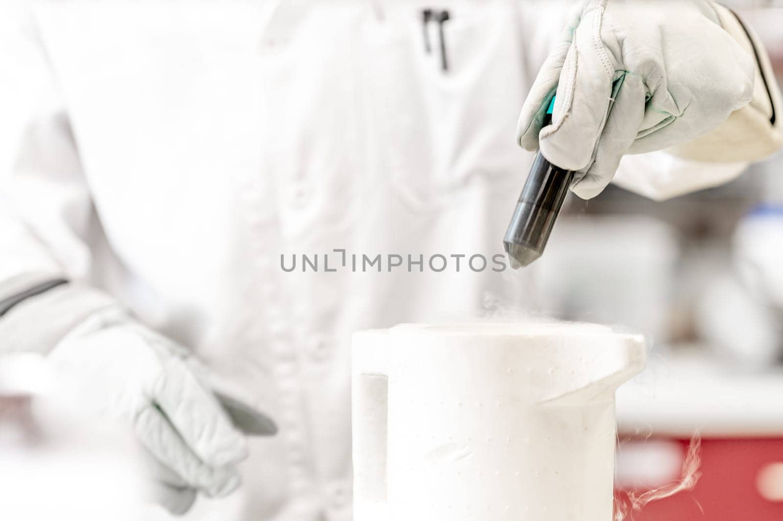scientific experiments with liquid nitrogen in a research laboratory by Edophoto