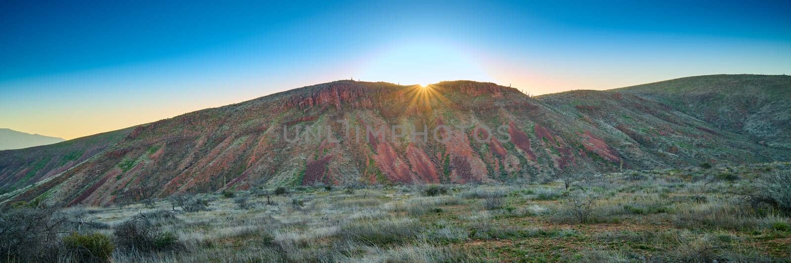 Sunrise over red rock cliffs in Tonto National Forest, Arizona. by patrickstock
