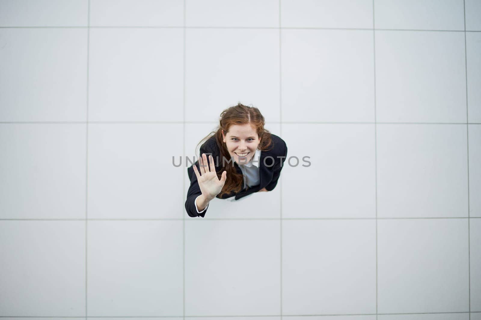 Full size photo of young smiling happy positive good mood girl go to. view from above