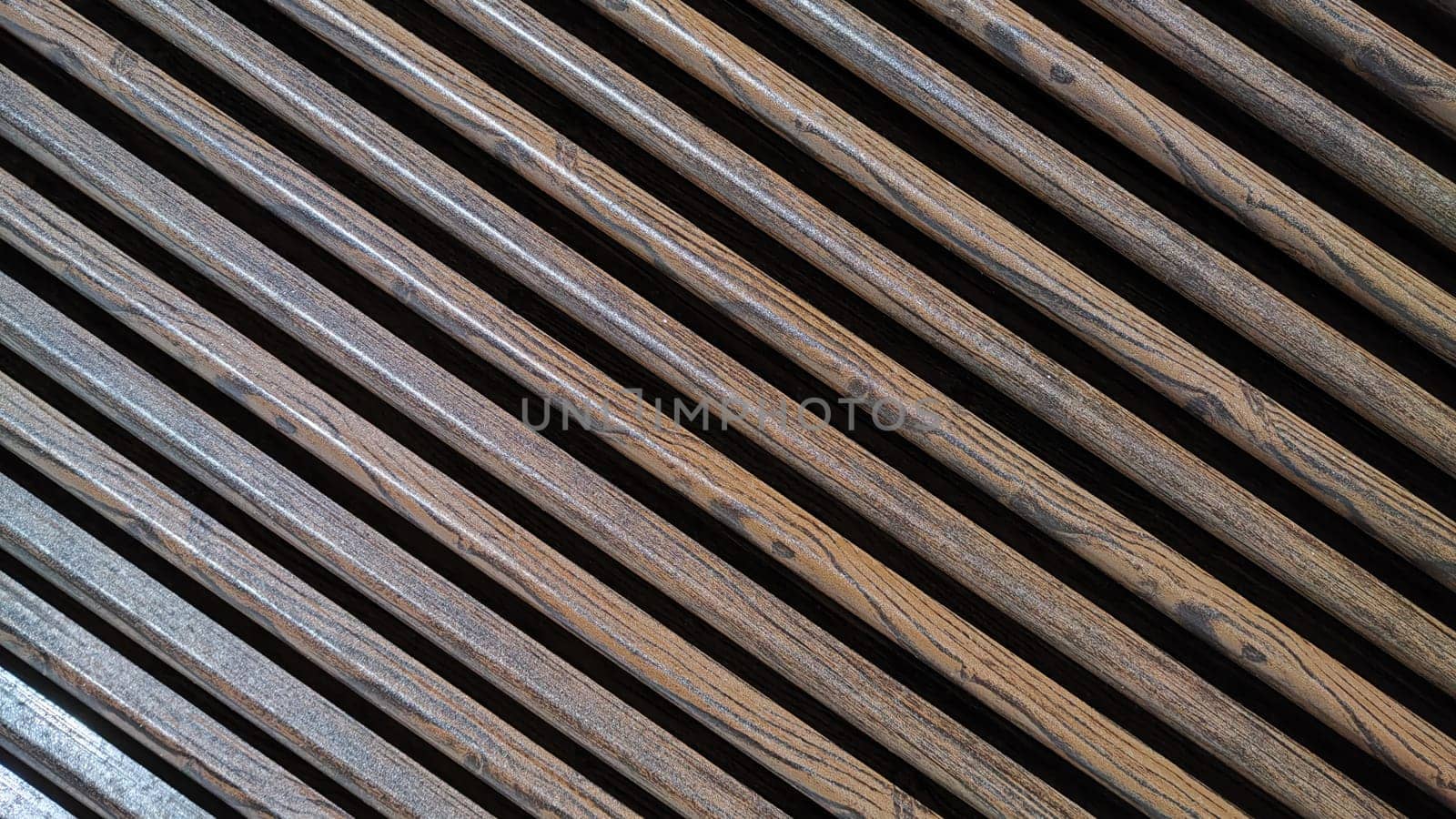 Fence made of wooden slats as Location, Background, texture, copy of space, frame. Abstract natural graphic resource