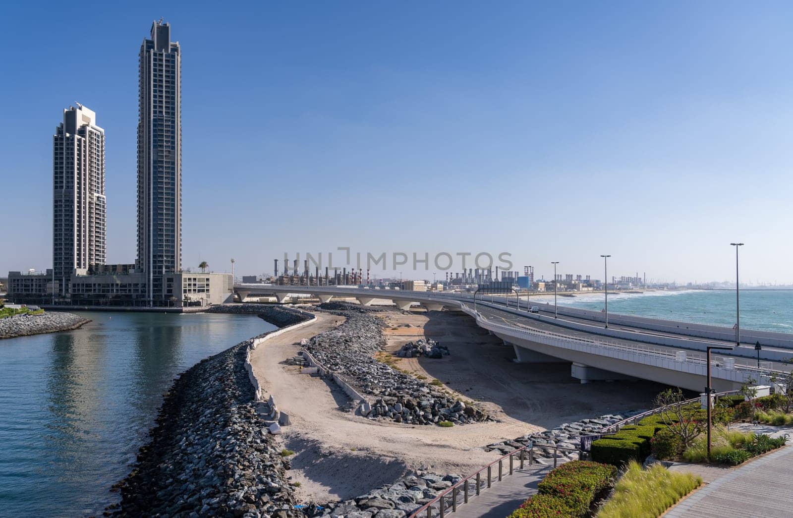 Industrial power station and water treatment plants on the edge of JBR beach in Dubai