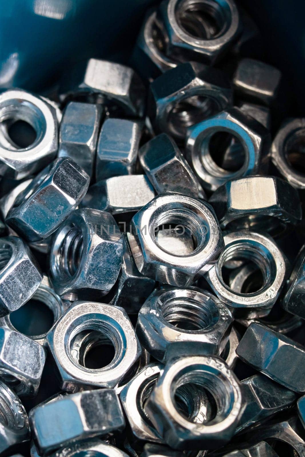 Nuts in a blue plastic box close up