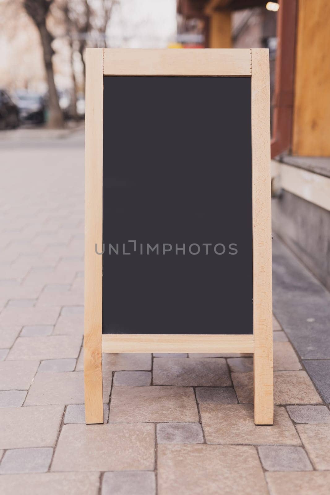 Mockup empty blank of cafe menu chalkboard on street - copy space and empty space for advertising mock-up by Satura86