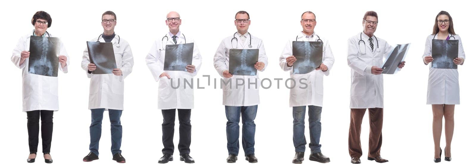 group of doctors holding x-ray isolated on white background