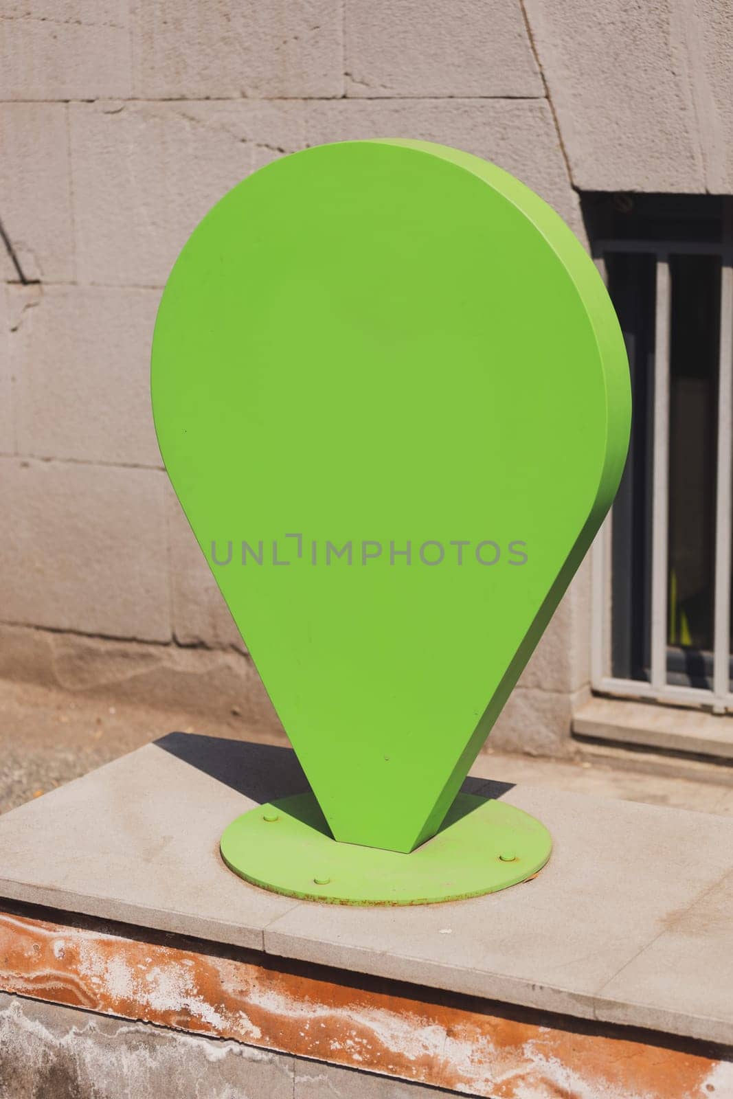 Geolocation sign on the street. Urban sign of location for map and app. Online navigation and GPS concept by Satura86