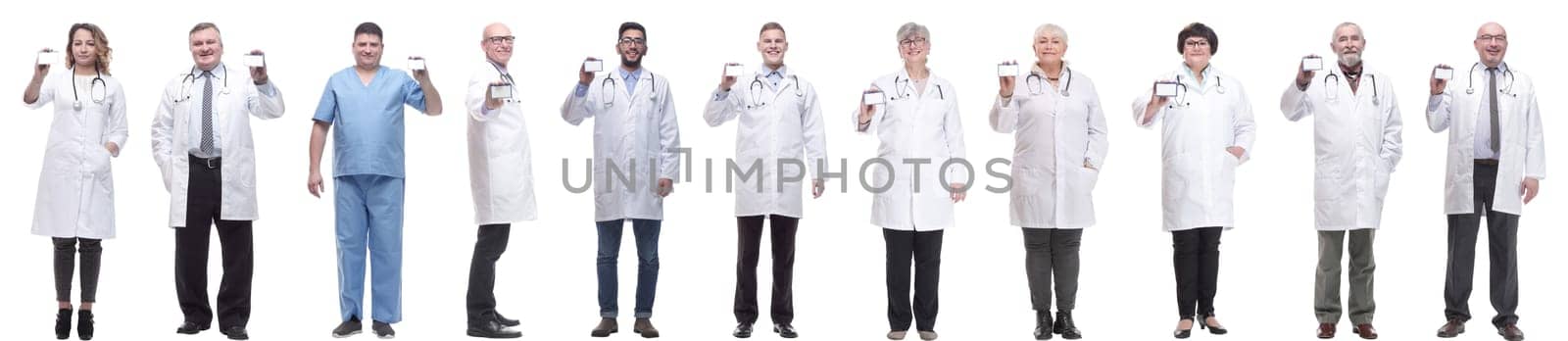 full length group of doctors showing badge isolated on white background