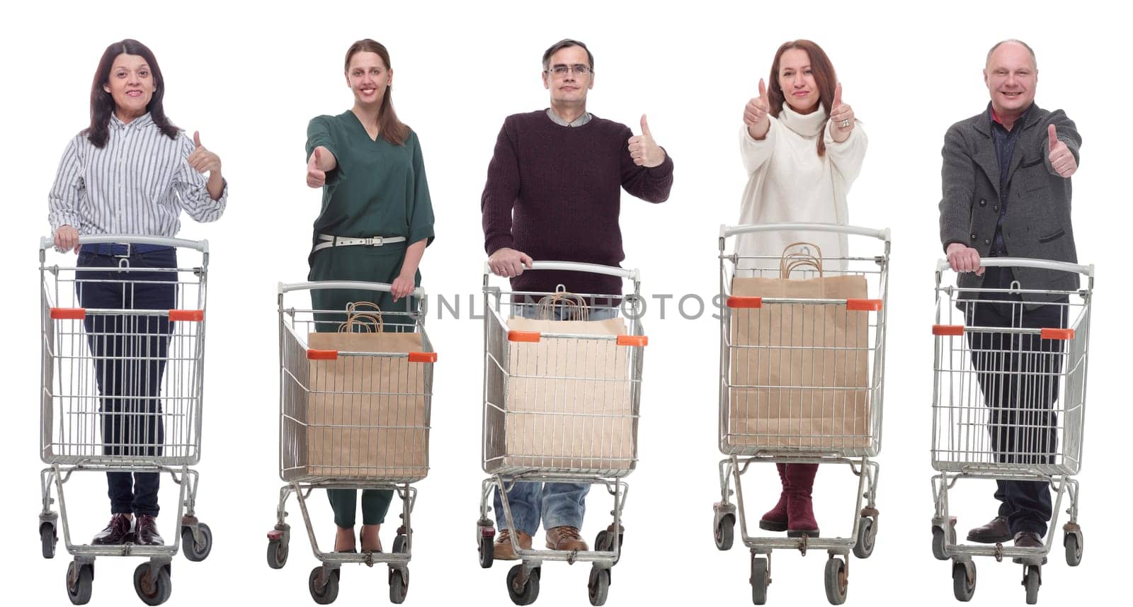 group of people with shopping cart showing thumbs up isolated on white background