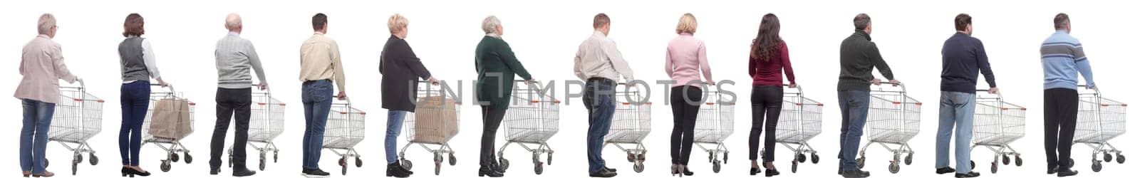 a group of people with a cart stand with their backs isolated on a white background