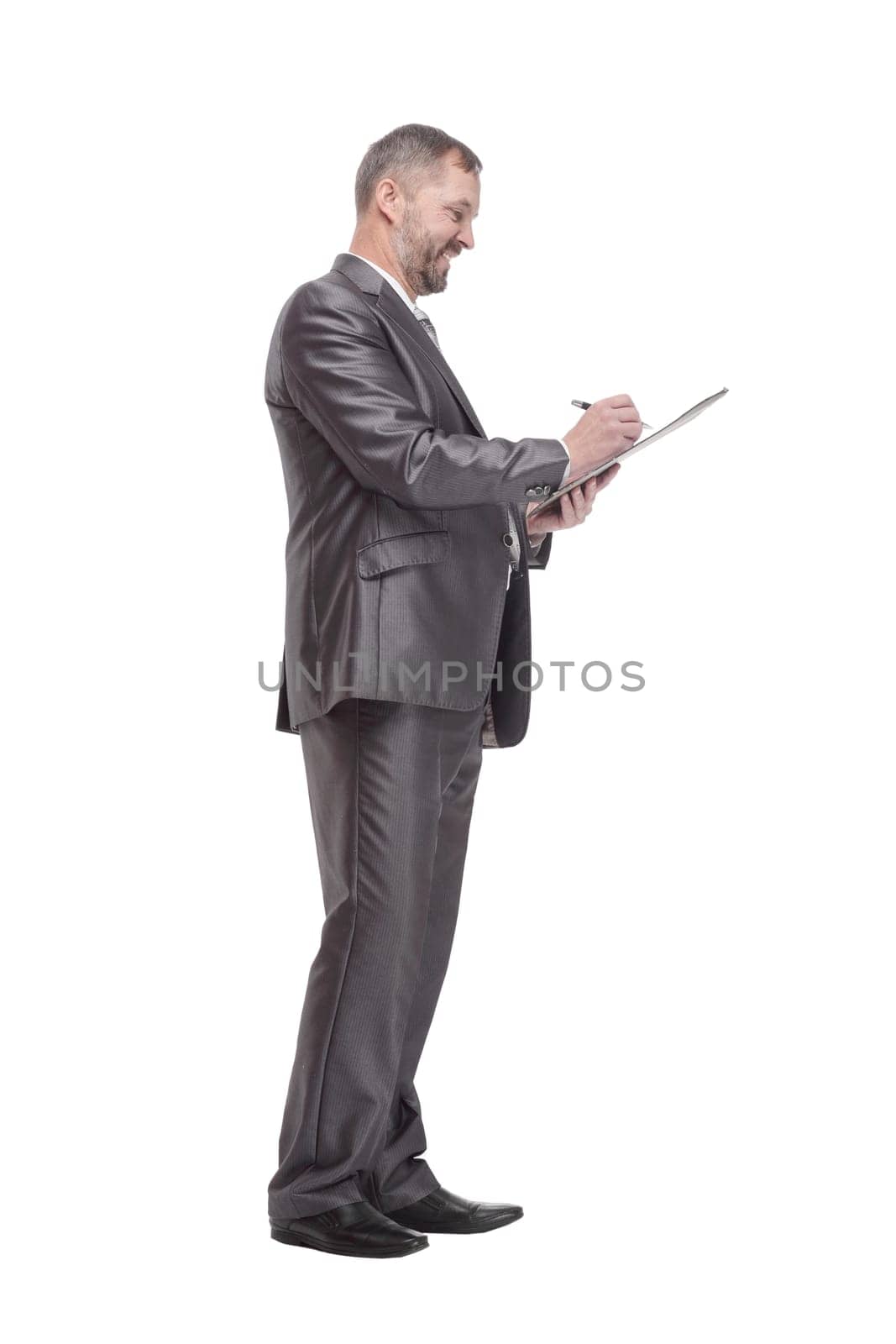 full-length. business man with clipboard. isolated on a white background.