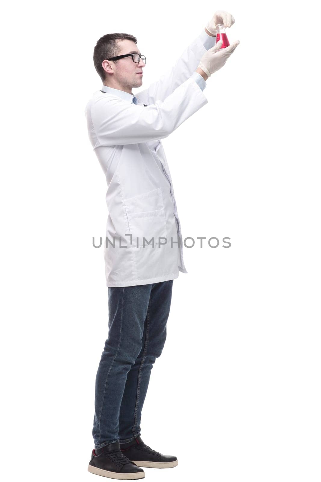 male doctor with a laboratory flask. isolated on a white background.