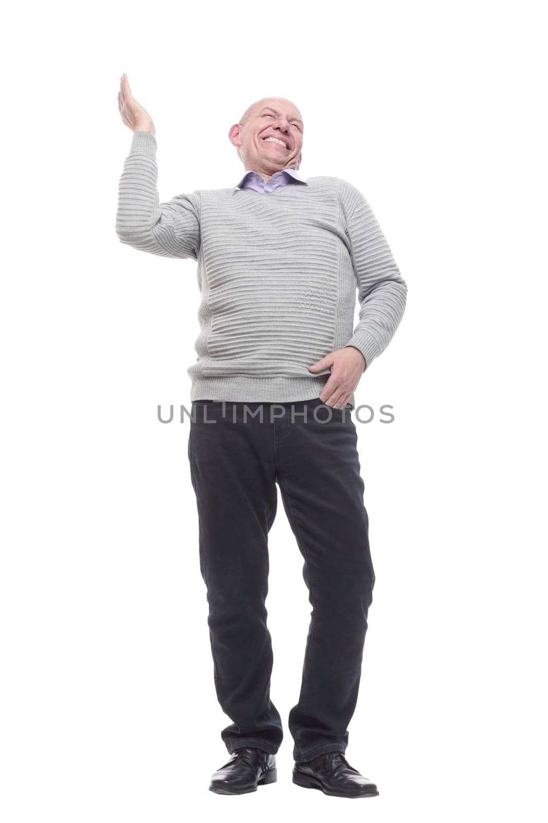 in full growth. charismatic man in a white jumper . isolated on a white background.