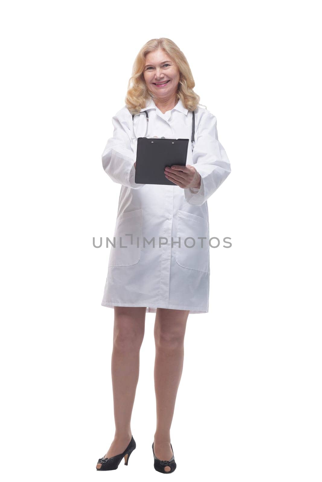 in full growth. smiling female doctor with clipboard . isolated on white background.