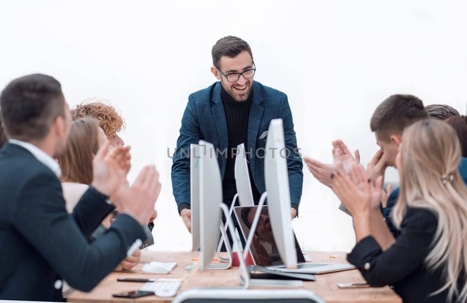 project Manager asks questions during an office meeting. photo with a copy of the space