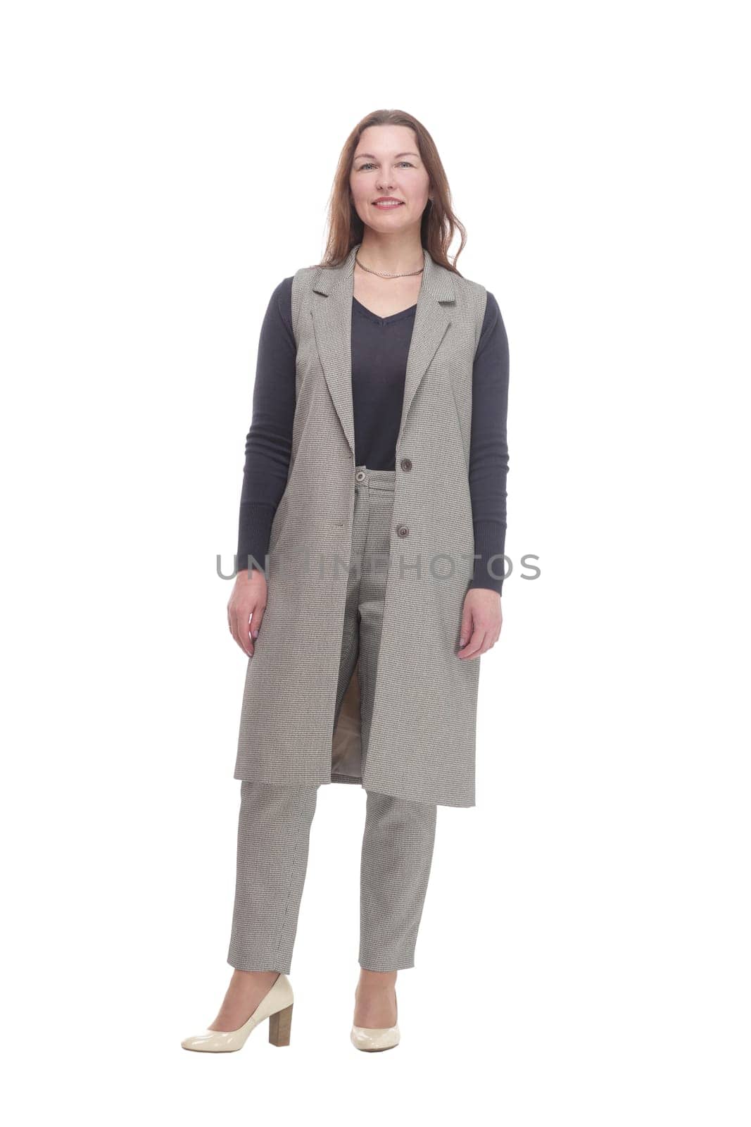 in full growth. elegant woman in a pantsuit.isolated on a white background.
