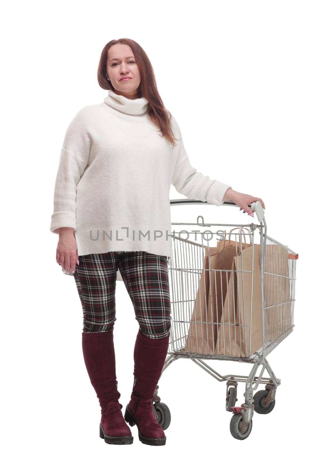 full-length. casual woman with shopping cart .isolated on a white background.