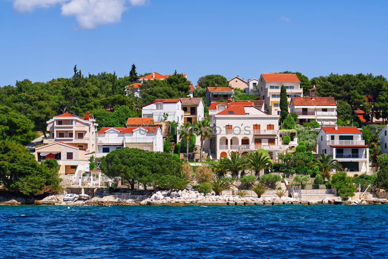 Trogir town panoramic view. UNESCO world heritage site panoramic view in Dalmatia, Croatia, tourist destination. View of sea coast in Trogir town with colorful houses