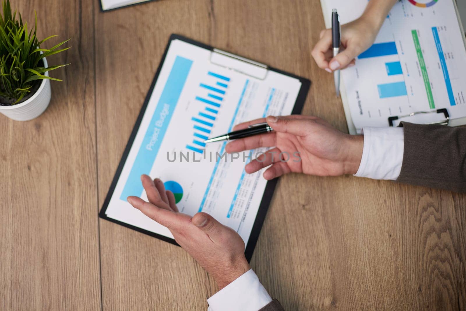 A man looks through information about a company.