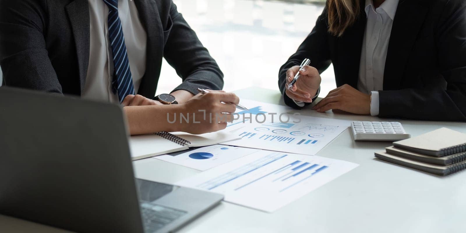 Business adviser meeting to analyze and discuss the situation on the market. Businessman discuss project planning with colleague financial Concept.