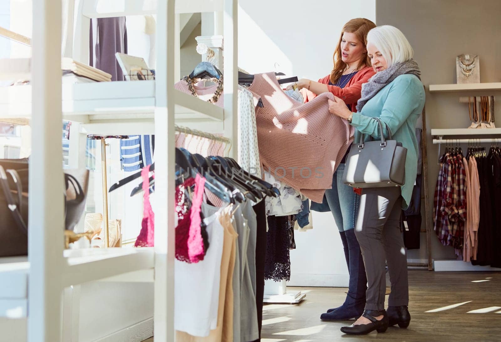 Style and fashion runs in the family. a mother and daughter shopping in a clothing store