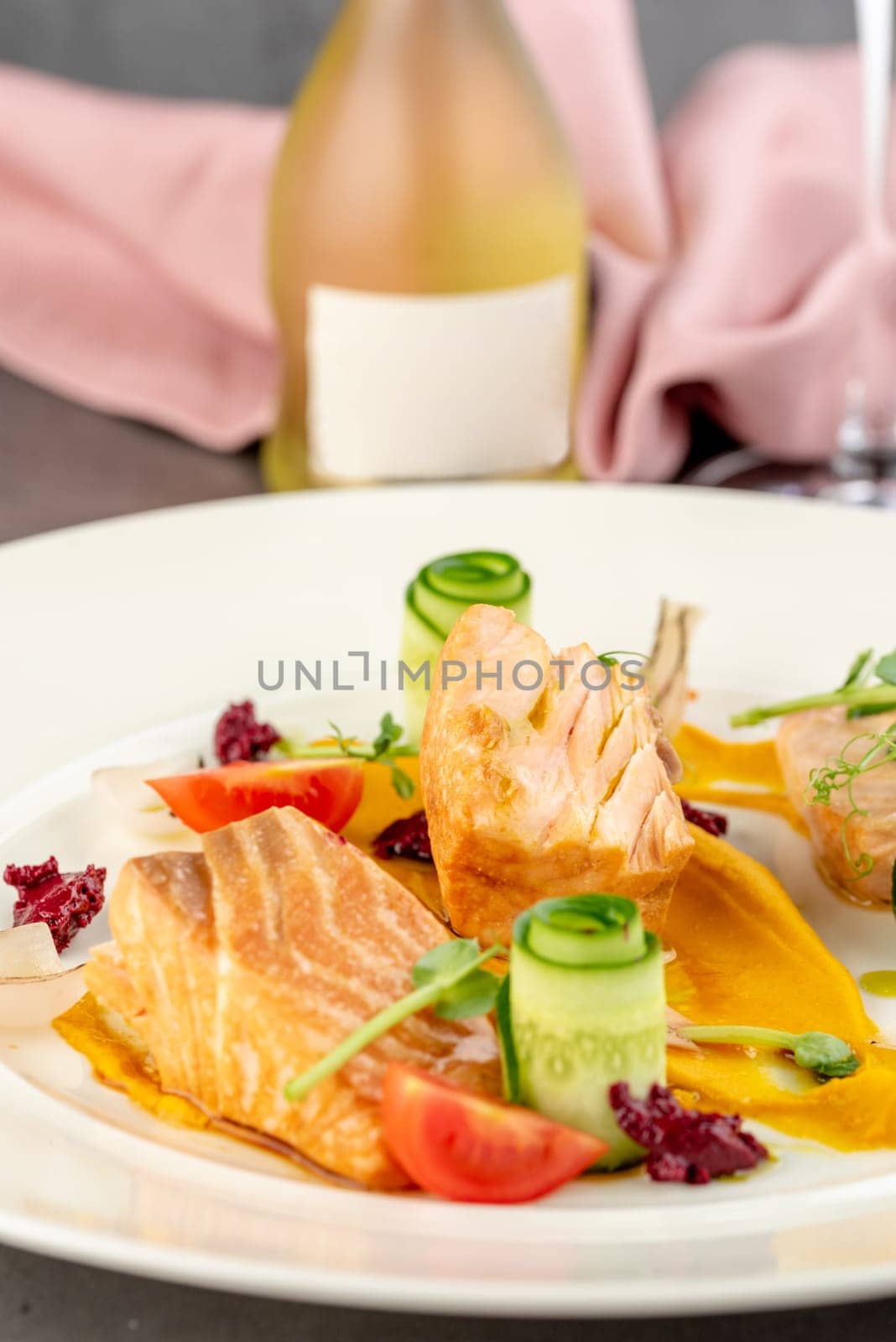 Smoked salmon on stone table in fine dining restaurant
