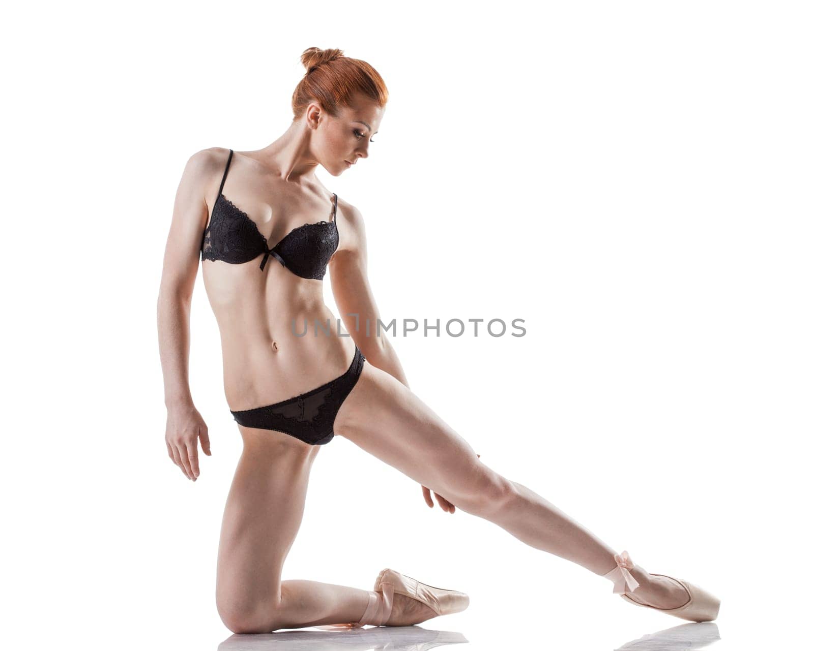 Image of elegant slim ballerina isolated on white background
