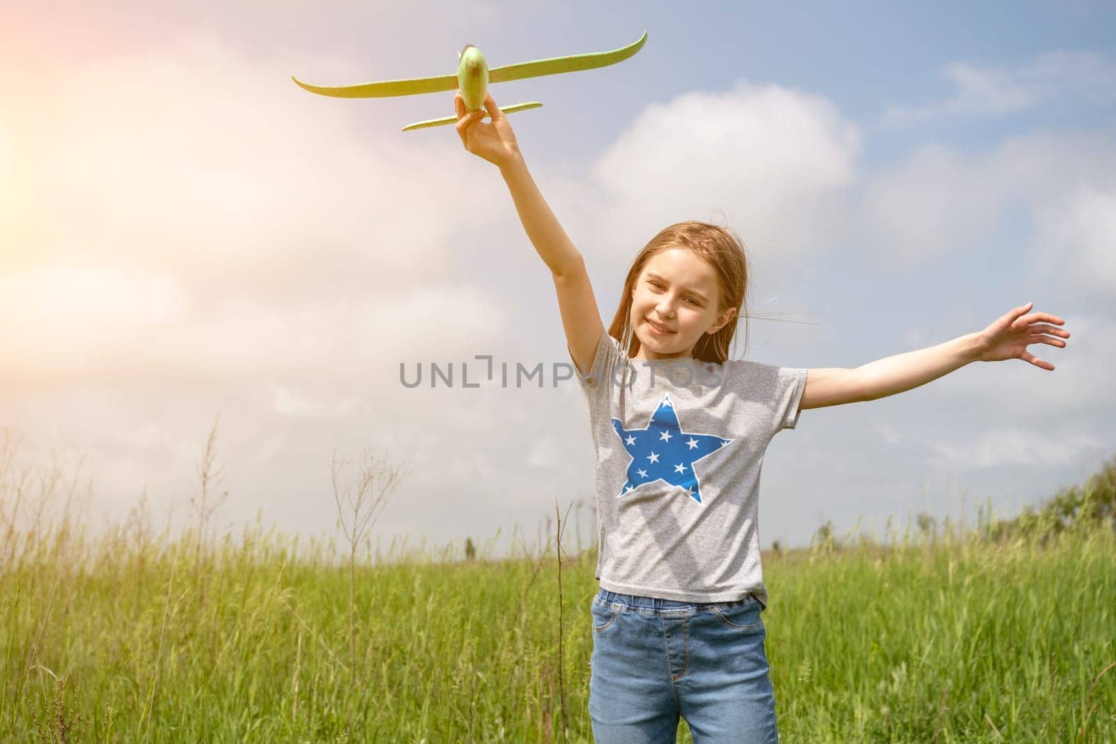Child playing with toy plane by GekaSkr