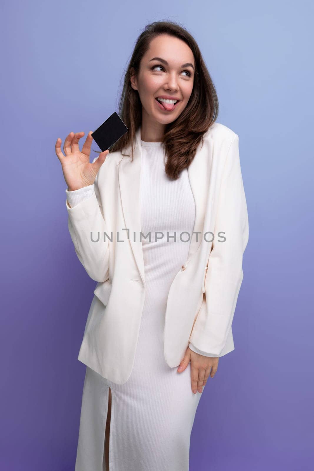 brunette business woman in dress is successful in model posing.