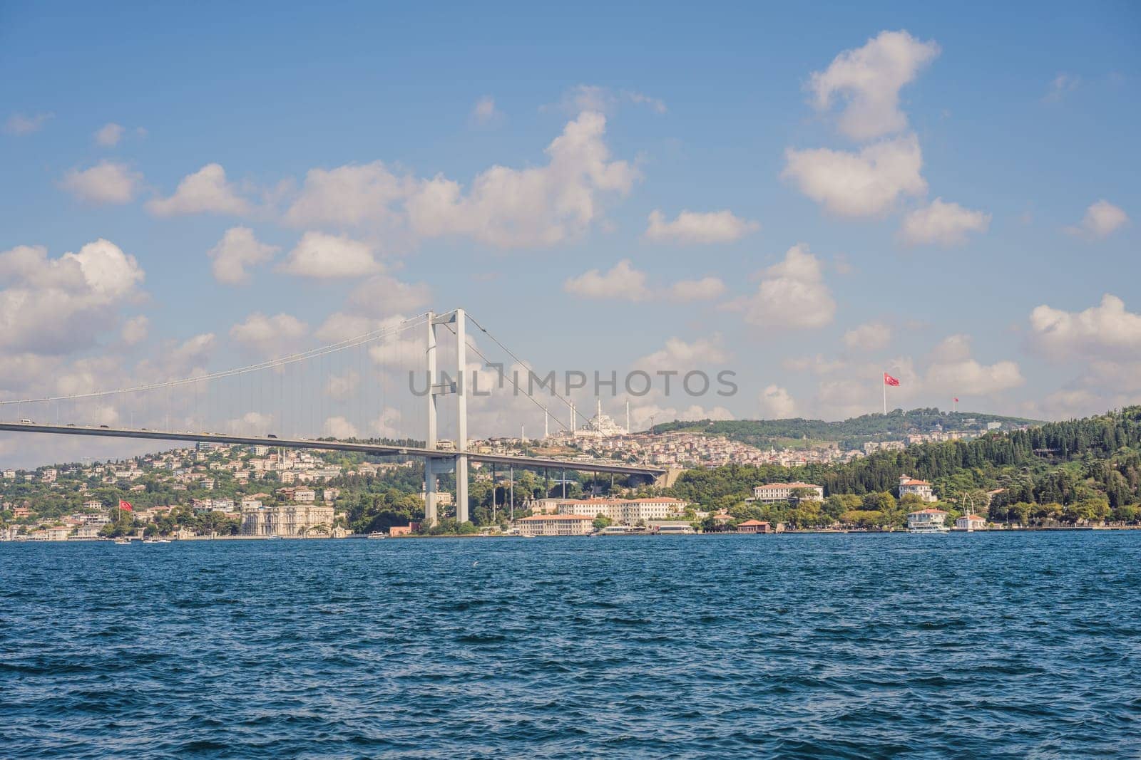 Bosphorus bridge on a summer sunny day, view from the sea, Istanbul Turkey.